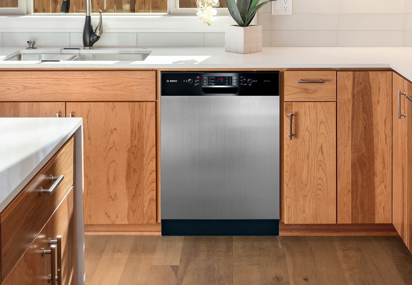 Instant Stainless magnetic cover on a dishwasher with a black control panel.