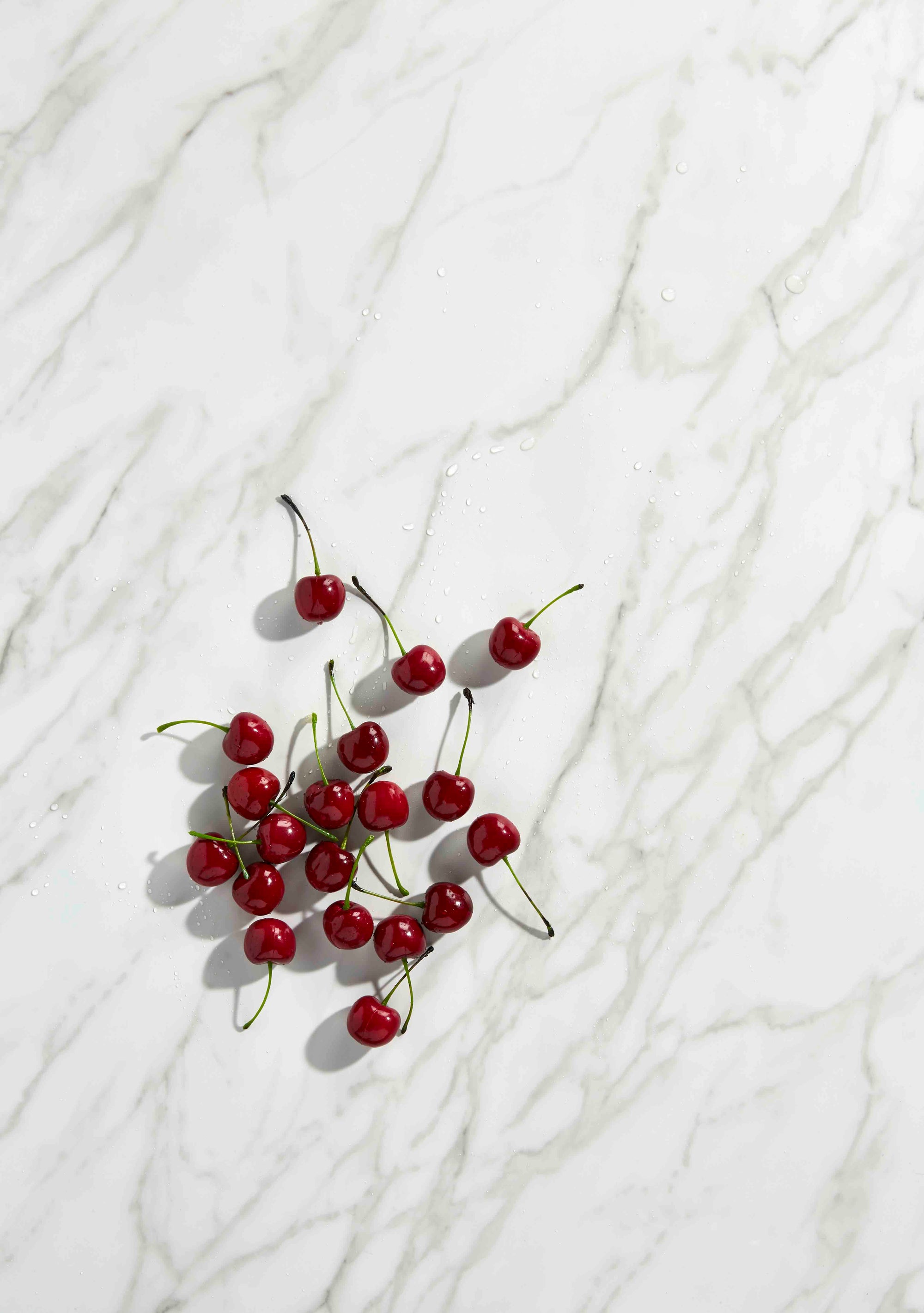 Cherries on Honed Matte White Italian Marble Countertop